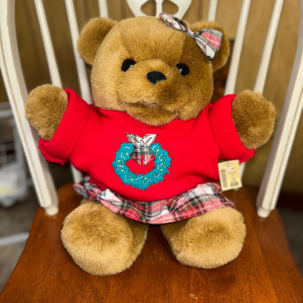 charming plush is a vintage holiday-themed teddy bear